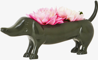 Bild av dekorativ blomkruka i form av en tax