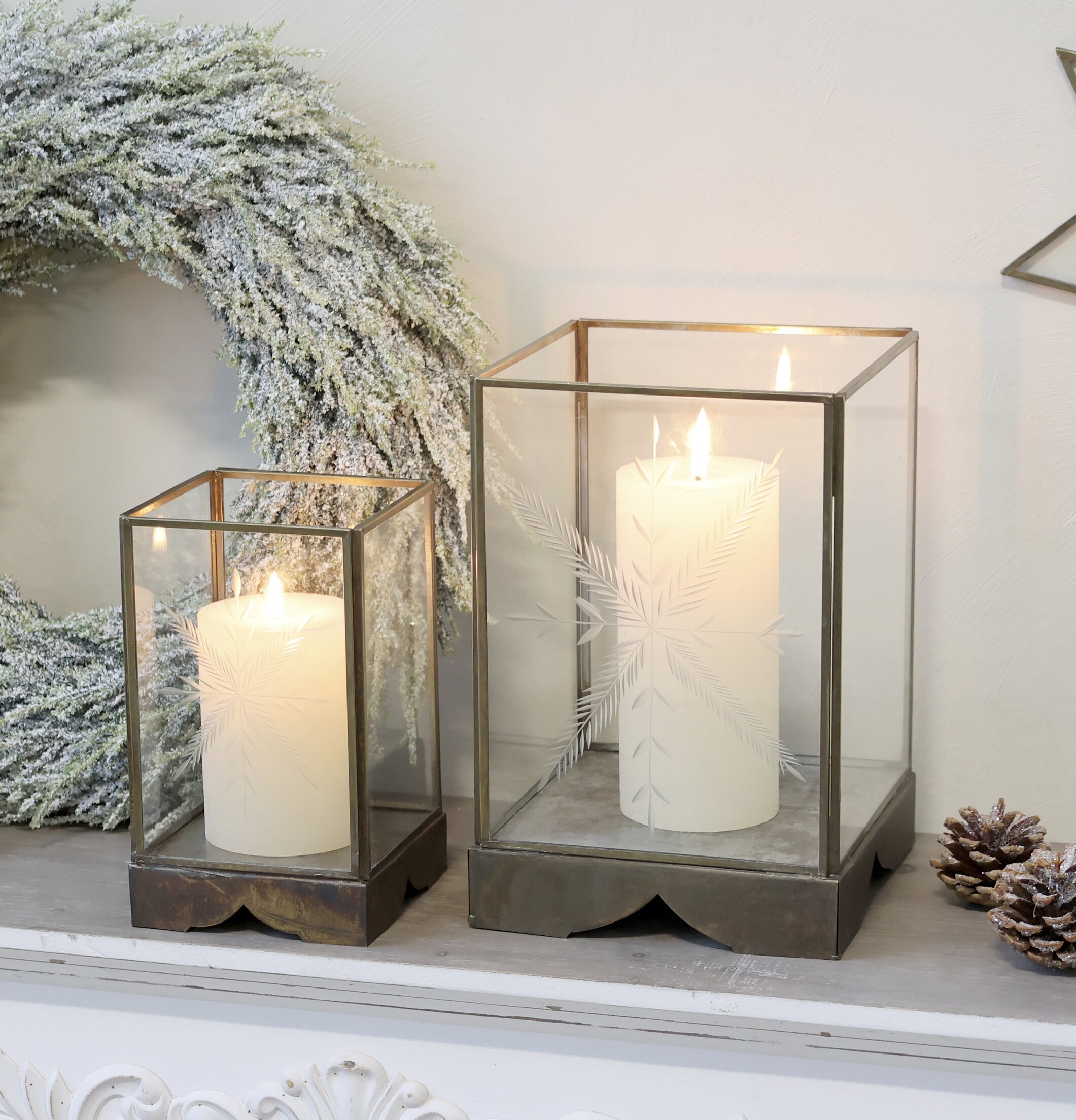 Bild av stilfulla ljuslyktor med vintrigt tema