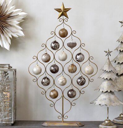 Bild av elegant juldekoration med antik mässingsstjärna