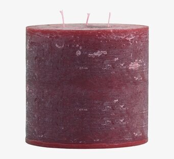 Foto av mörkrött blockljus med tre vekar