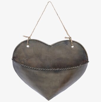 Bild av dekorativt hjärta i antik mässing med snöre