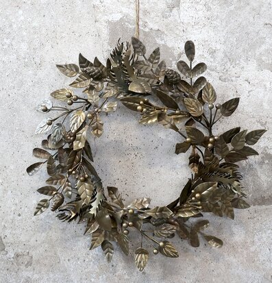 Bild av dekorativ krans i antik mässing med detaljer