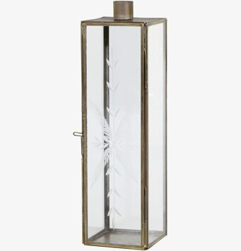 Foto av elegant ljusstake i antik mässing med glas