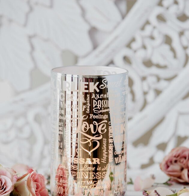 Bild av dekorativ glascylinder med romantisk känsla