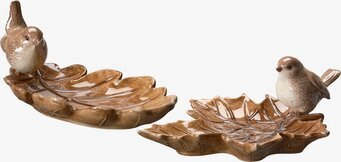 Bild av dekorativ fågel på löv med naturinspirerad stil