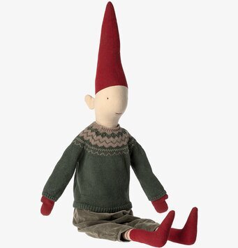 Bild av handgjord docka med detaljerad klädsel