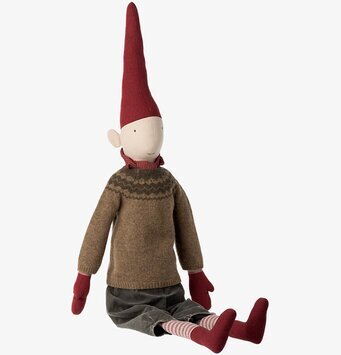 Bild av charmig tygdocka med festlig och mysig stil