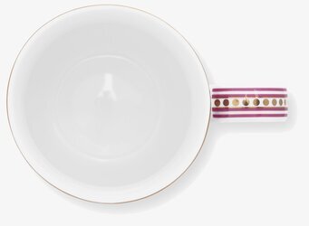 Bild av dekorativ mugg med unik design och färgpalett