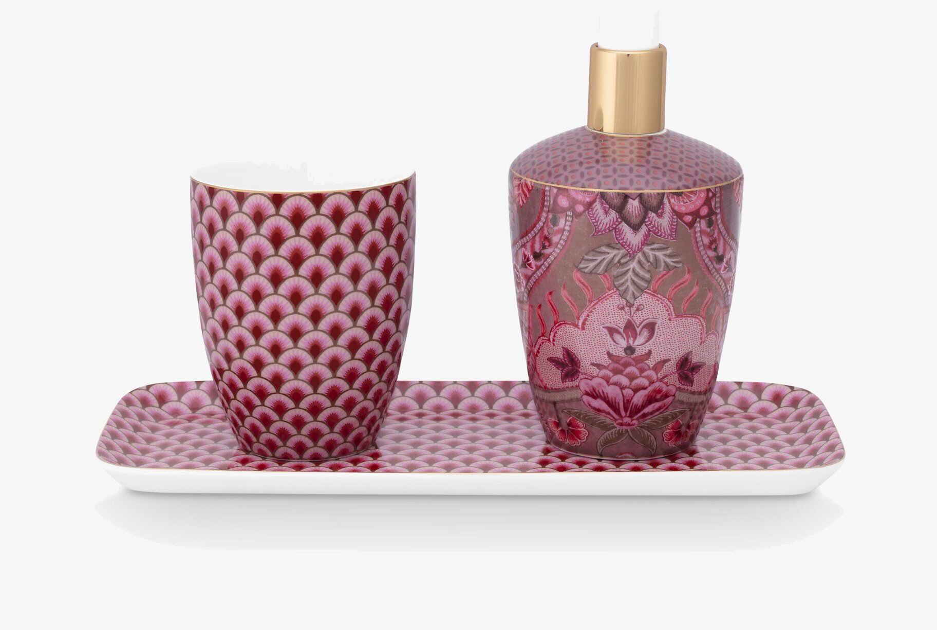 Bild av elegant badrumsset med rosa och guld detaljer