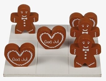 Foto av charmigt julspel med pepparkakor och hjärtan