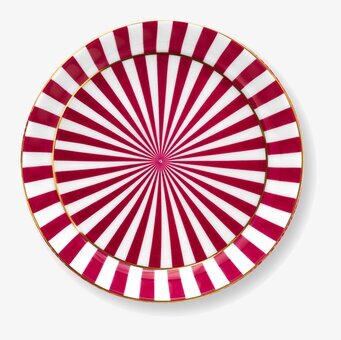 Bild av tallrik med strålande linjer och guldkant