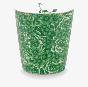 Bild av mugg med frodigt blomstermönster och grönska