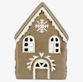 Bild av detaljrik ljuslykta i form av pepparkakshus