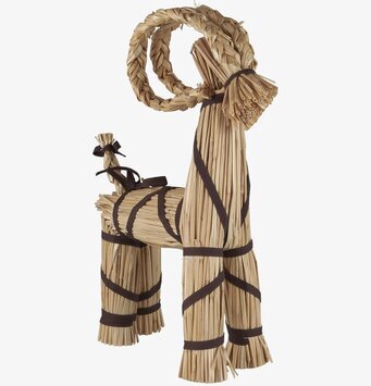 Foto av en klassisk julbock av halm med bruna band