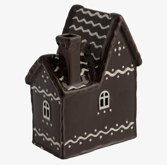 Foto av charmig ljuslykta i pepparkakshusdesign