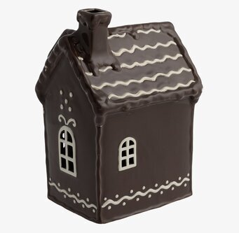 Bild av charmigt pepparkakshus som ljuslykta