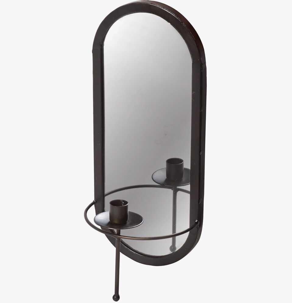 Foto av spegel med antiksvart ram och ljushållare