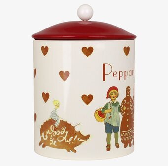 Bild av festlig plåtburk med julmotiv och pepparkakor