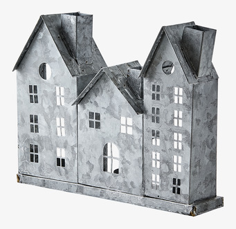 Bild av charmig ljuslykta med små stiliserade hus