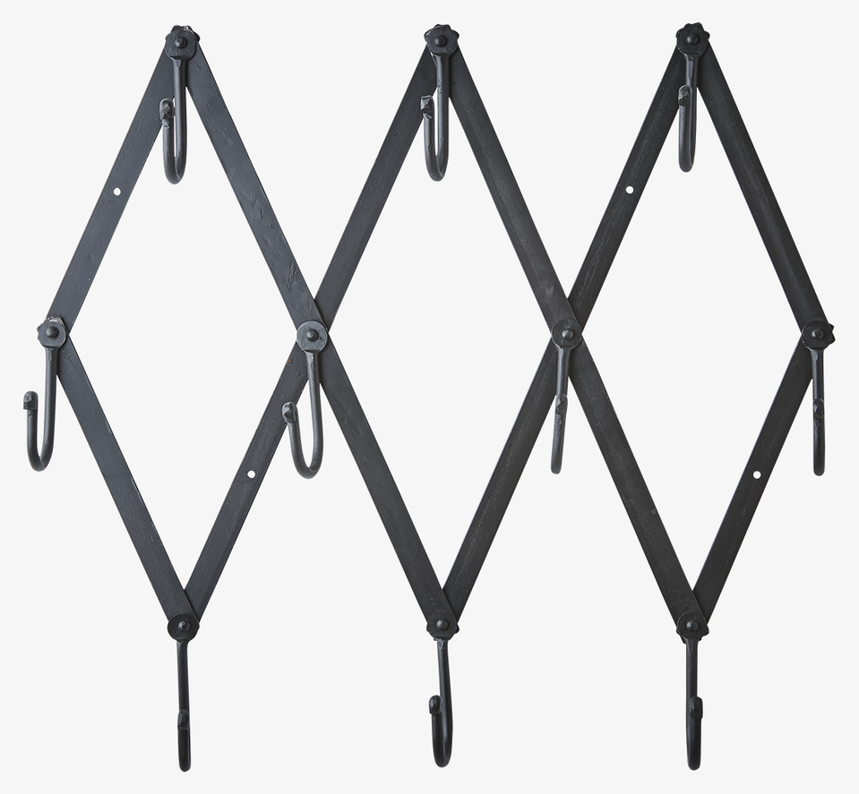 Bild av innovativ svart klädhängare med vikbar design