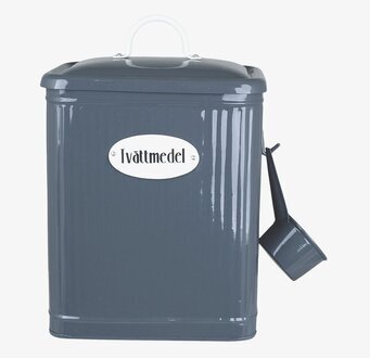 Foto av stilren retroinspirerad plåtburk för tvättmedel