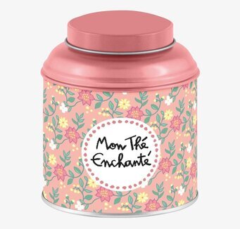 Bild av rosa teburk med blommönster och textdetalj