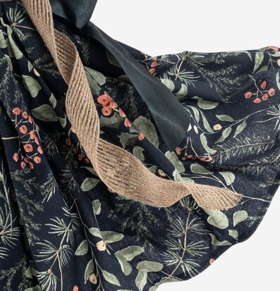 Bild av textil med naturligt mönster och rustik snodd