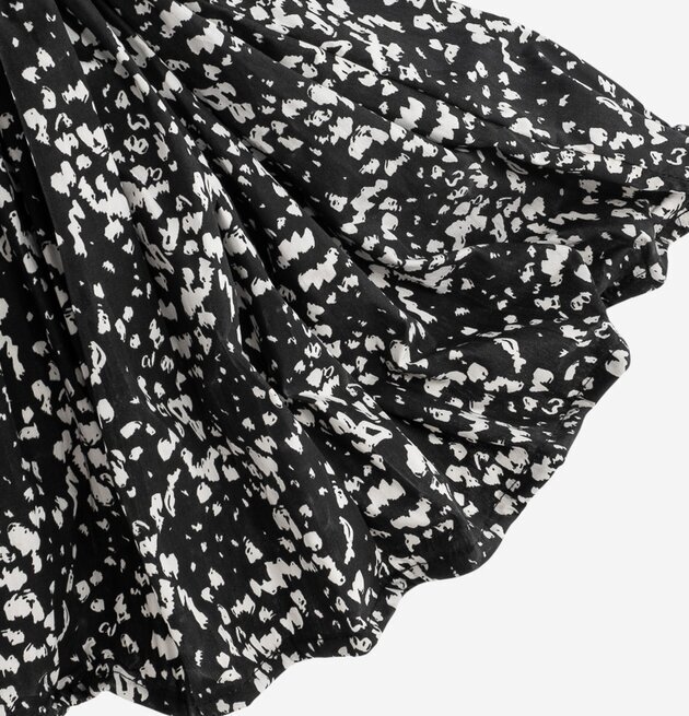 Bild av tyg med svartvitt mönster och textur