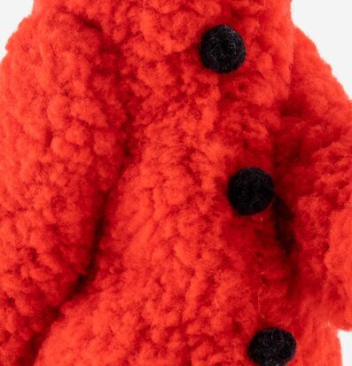 Bild av detaljerad textur med röd och mönstrad yta