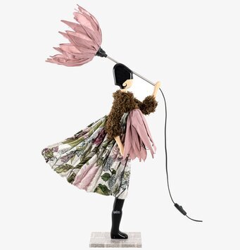 Bild av en unik bordslampa med blomformad skärm