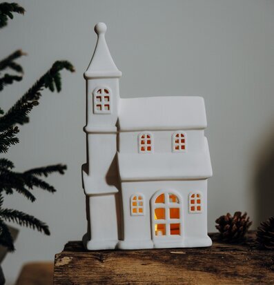 Bild av stilfull ljusstake i keramik med naturtema