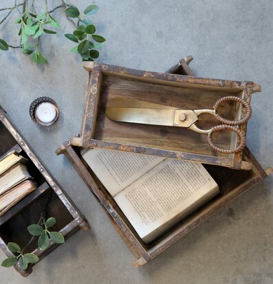 Foto av rustik inredning med böcker och hantverk