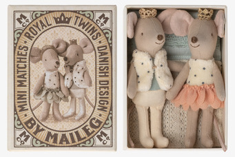 Bild av charmiga leksaksråttor i elegant förpackning