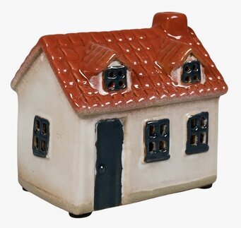 Bild av en detaljrik ljuslykta formad som ett hus