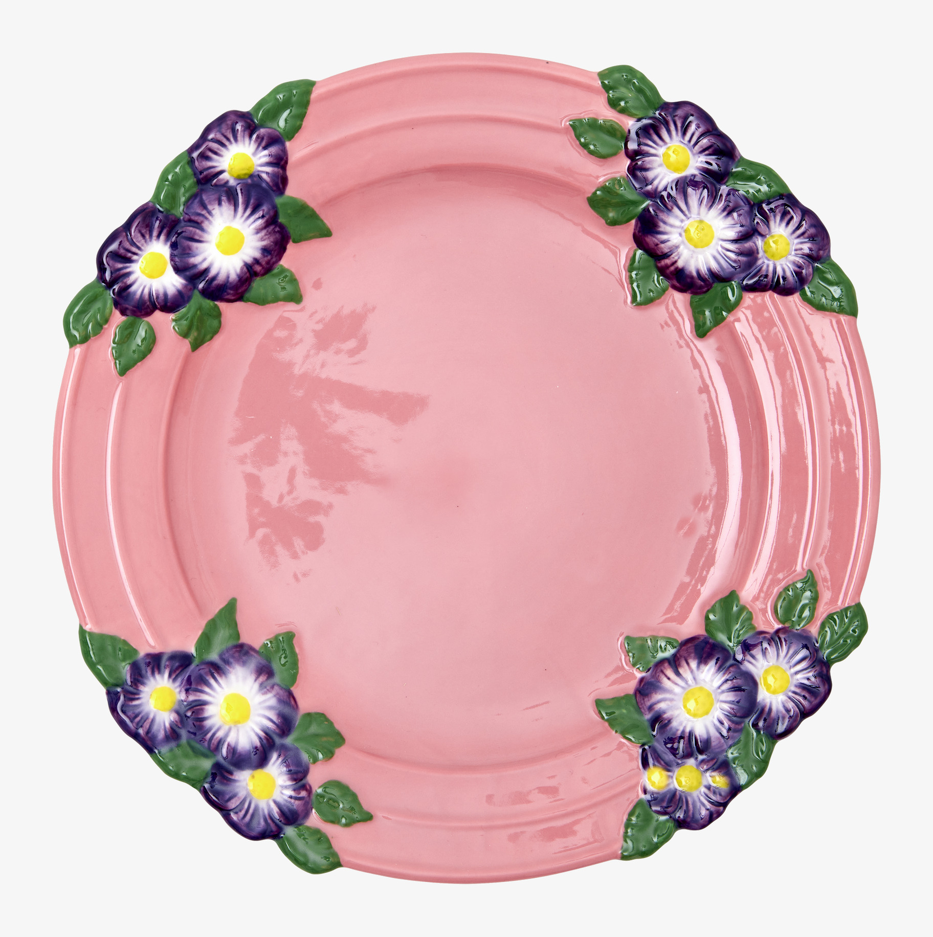 Bild av rosa keramiktallrik med blommig design