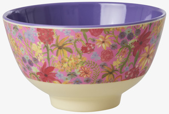 Foto av färgglad skål med blommönster och lila insida