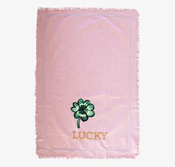 Bild av kökshandduk med fyrklöver och textur