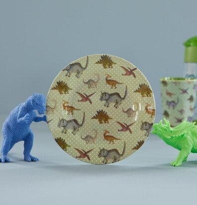 Foto av lekfull barntallrik med dinosauriemotiv