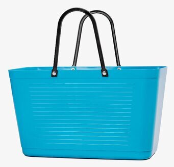 Bild av turkos väska med praktisk och stilren design