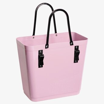 Bild av stilren gammelrosa väska med cykelfäste