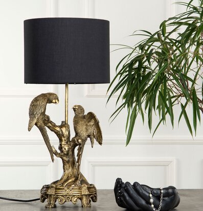 Bild av elegant bordslampa med fåglar och detaljer