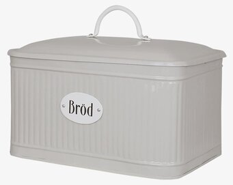 Foto av beige plåtburk för stilren brödförvaring
