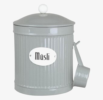 Foto av grön plåtburk för förvaring av müsli