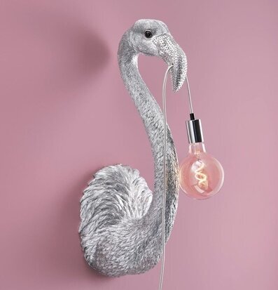 Bild av dekorativ vägglampa i form av en flamingo