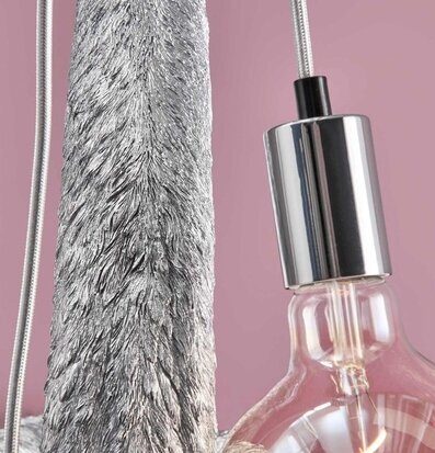 Foto av elegant vägglampa med silverdetaljer