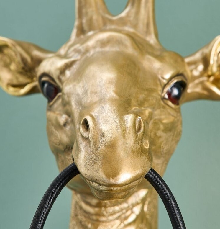 Vägglampa Giraff Guld från Werner Voss mot grön vägg