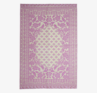 Bild av plastmatta med rosa och elfenbensvitt mönster