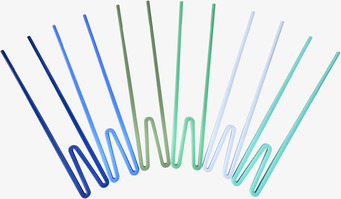 Bild av stilrena ätpinnar i blå och grön nyans