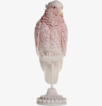 Bild: Rosa papegojfigur på stativ med eleganta detaljer