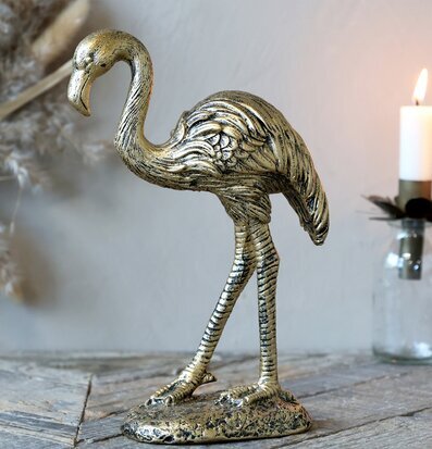 Bild av elegant mässingsflamingo med rustik känsla